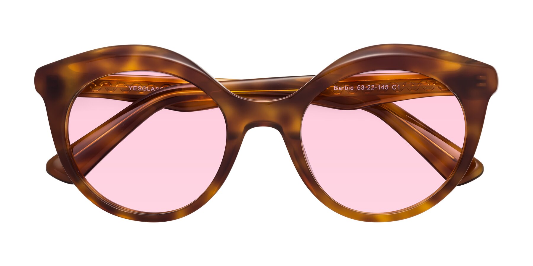 Folded Front of Barbie in Amber Tortoise with Light Pink Tinted Lenses