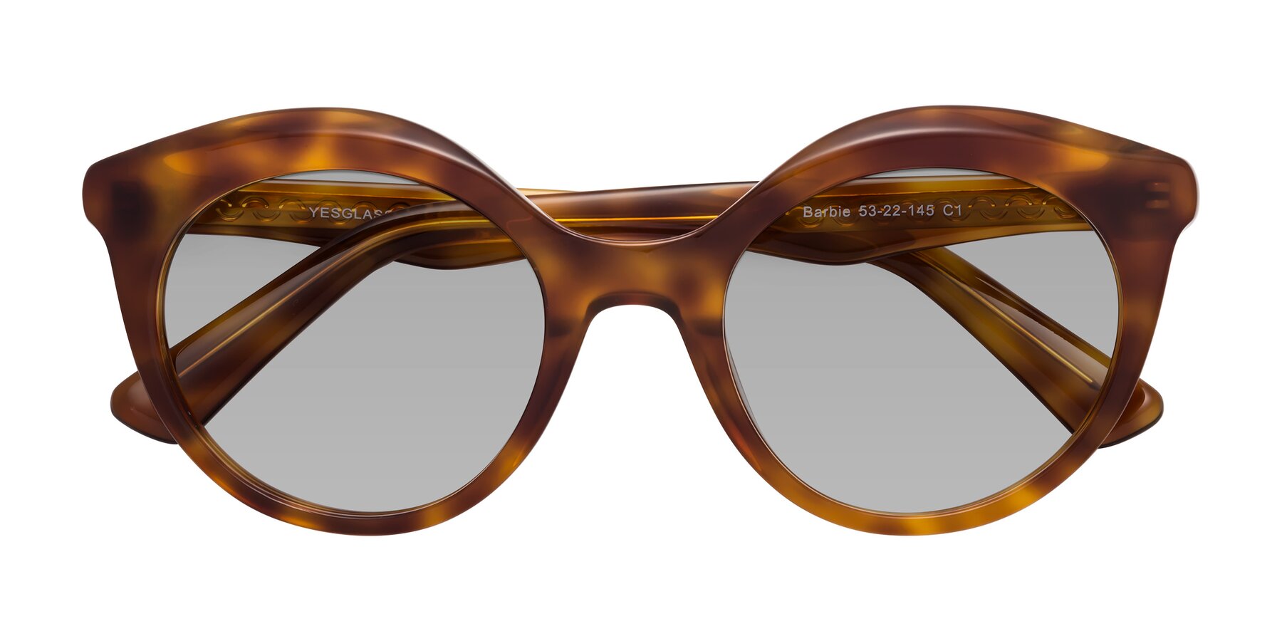 Folded Front of Barbie in Amber Tortoise with Light Gray Tinted Lenses