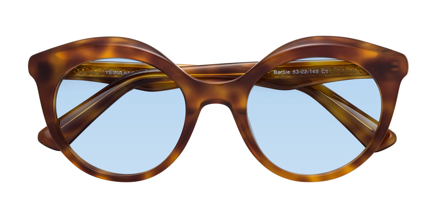 Folded Front of Barbie in Amber Tortoise with Light Blue Tinted Lenses