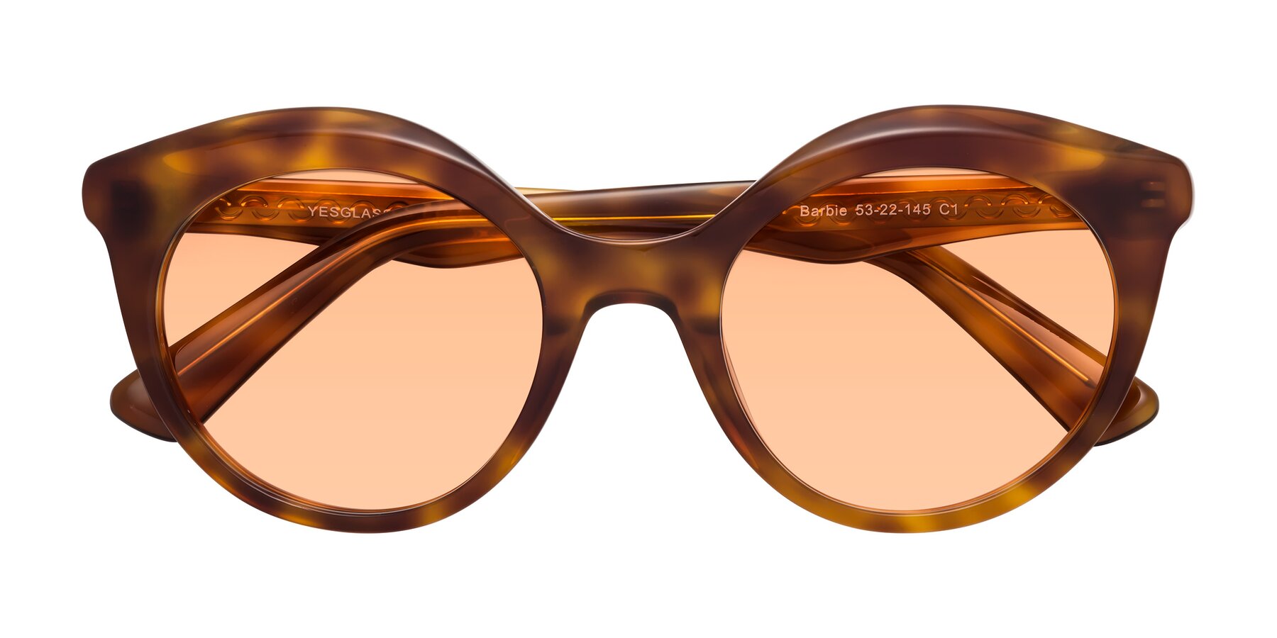 Folded Front of Barbie in Amber Tortoise with Light Orange Tinted Lenses