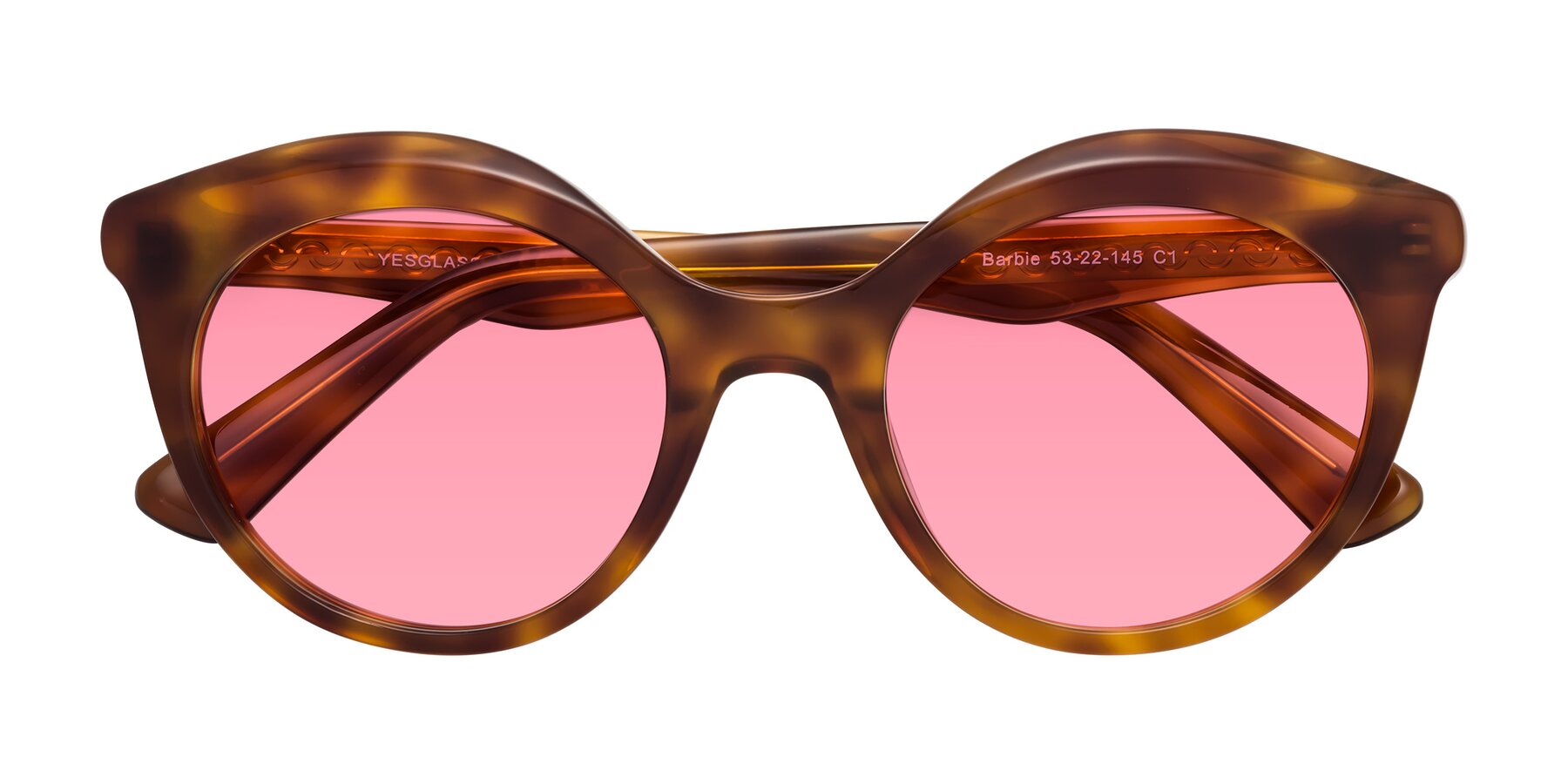 Folded Front of Barbie in Amber Tortoise with Pink Tinted Lenses