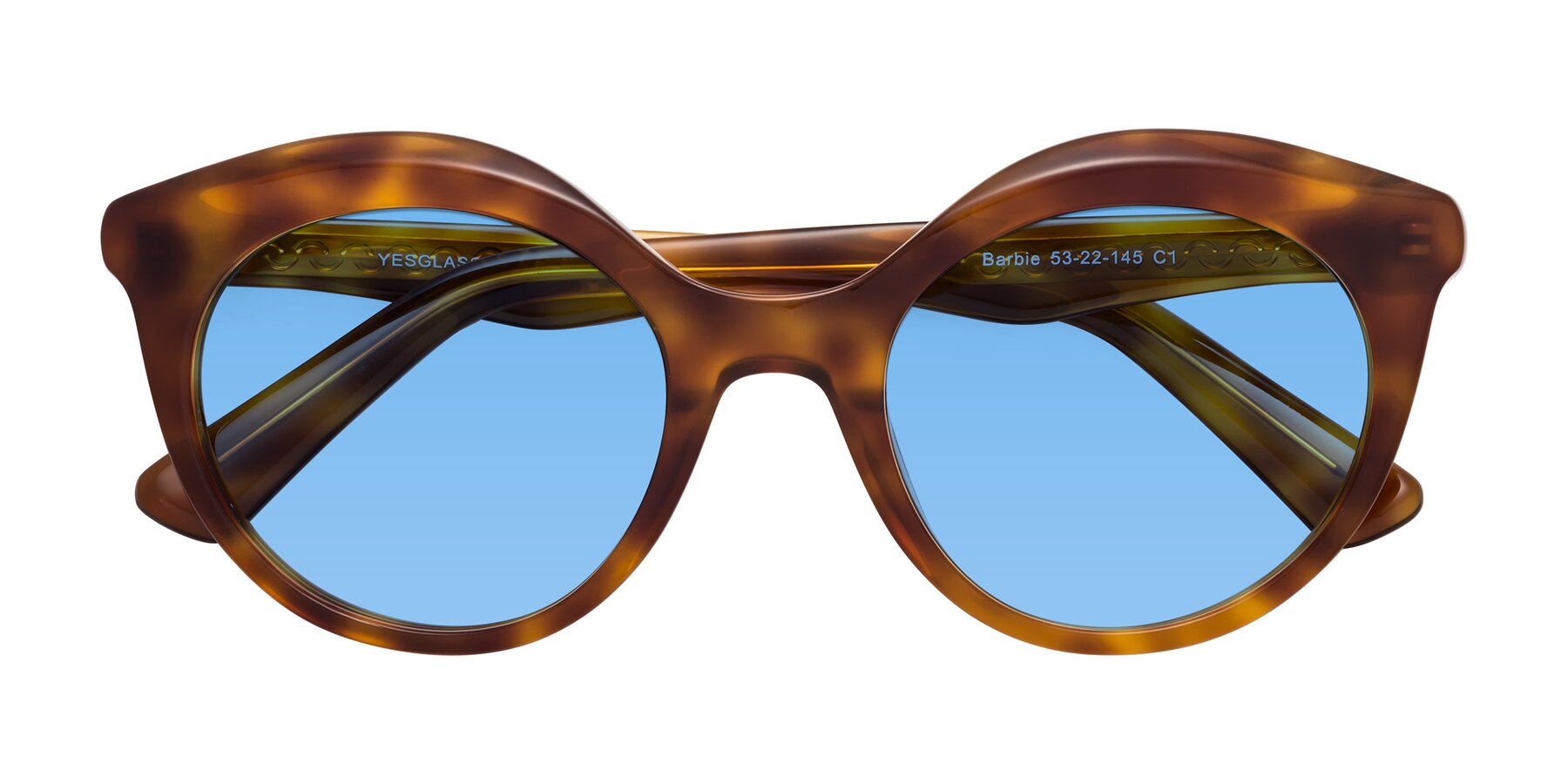 Folded Front of Barbie in Amber Tortoise with Medium Blue Tinted Lenses