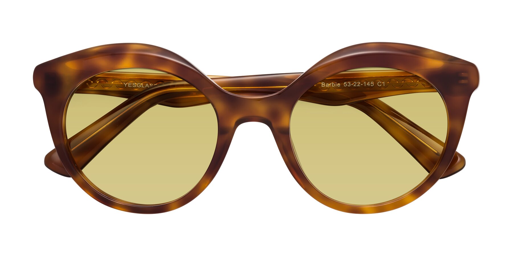 Folded Front of Barbie in Amber Tortoise with Medium Champagne Tinted Lenses