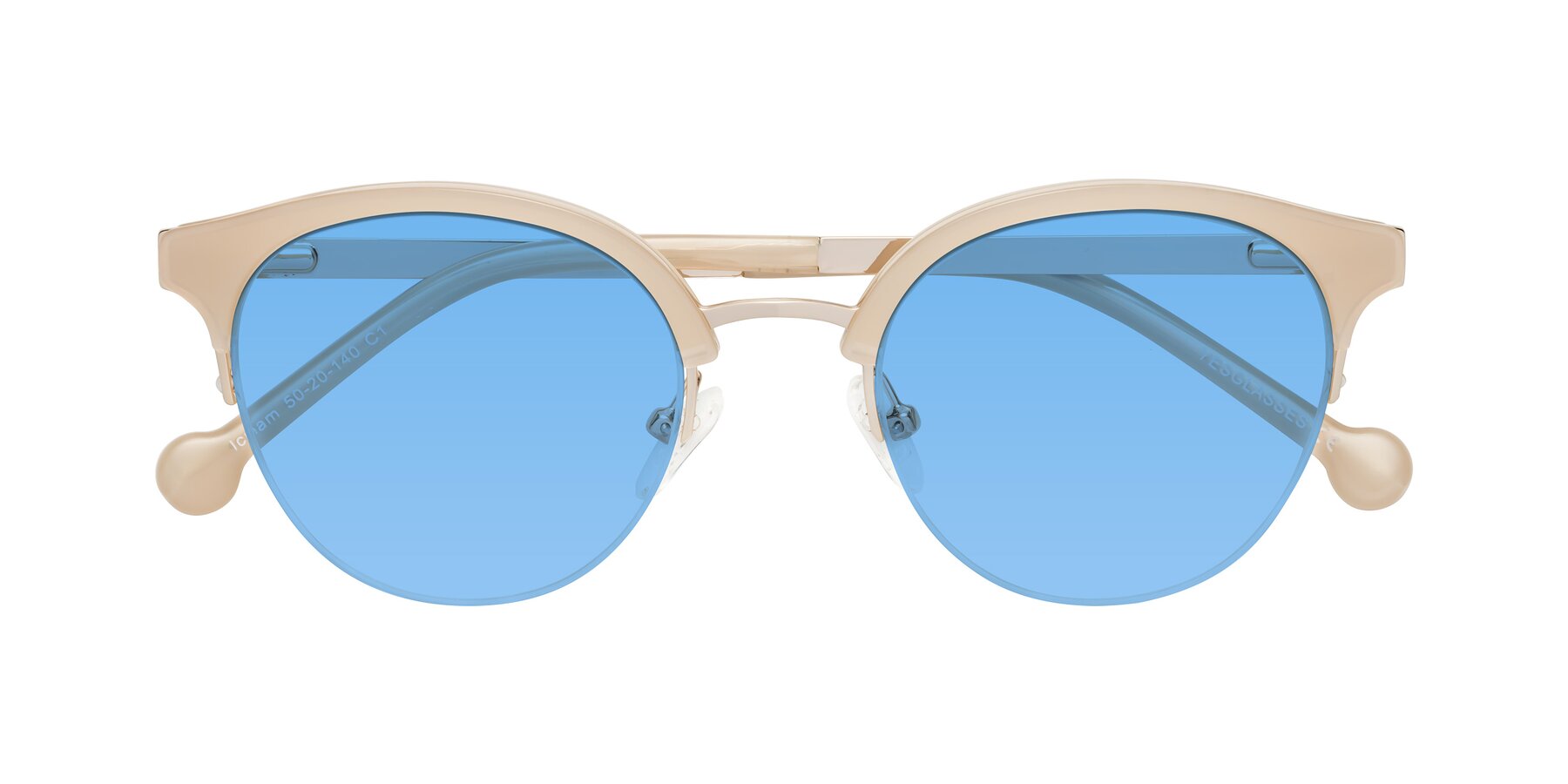 Folded Front of Icream in Beige-Gold with Medium Blue Tinted Lenses