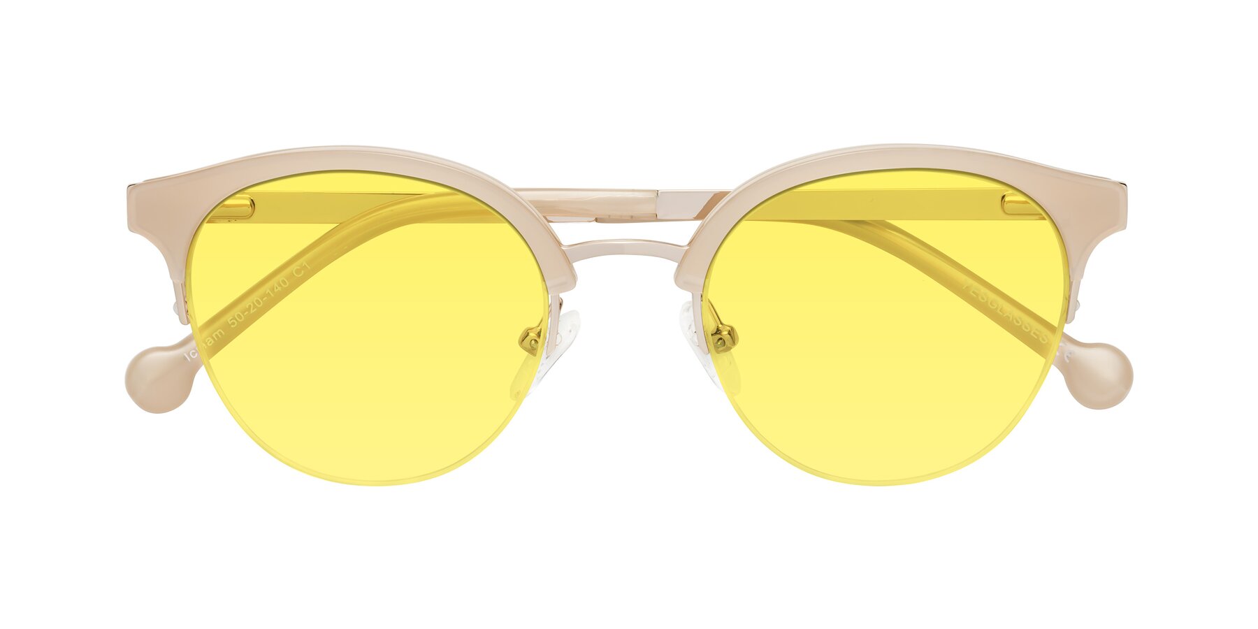 Folded Front of Icream in Beige-Gold with Medium Yellow Tinted Lenses