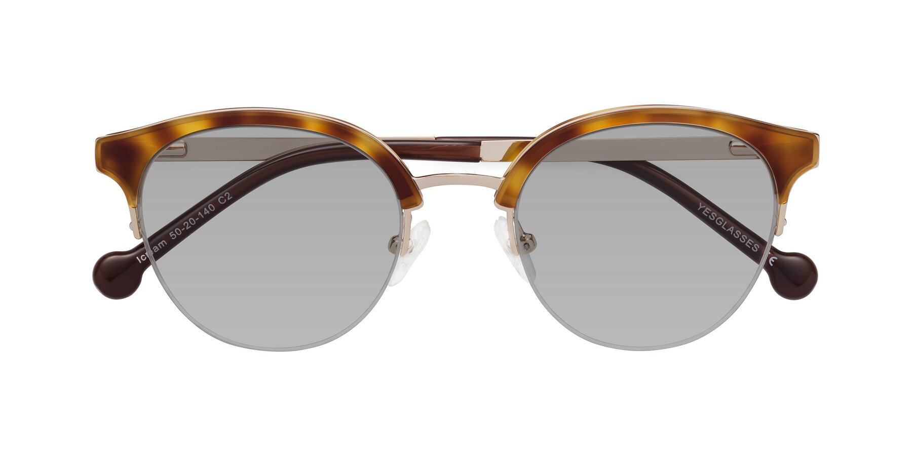 Folded Front of Icream in Tortoise-Gold with Light Gray Tinted Lenses