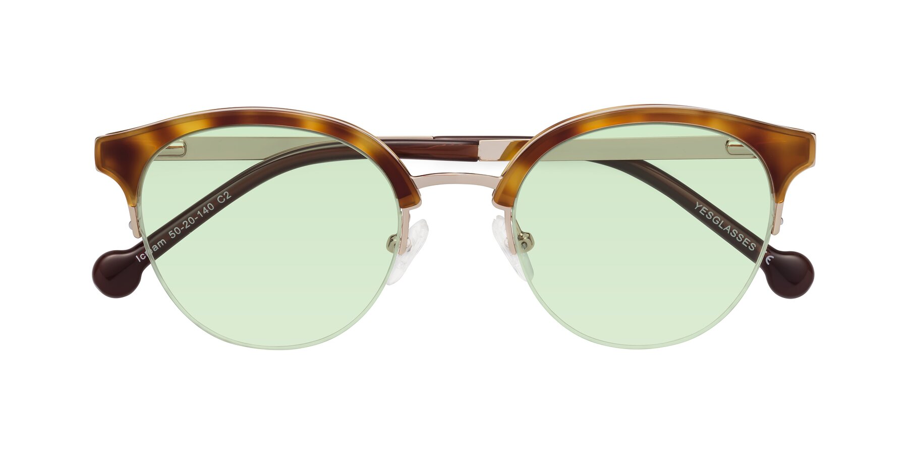 Folded Front of Icream in Tortoise-Gold with Light Green Tinted Lenses