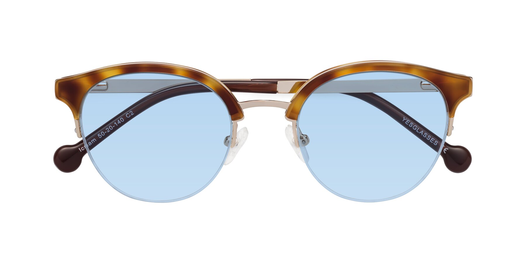 Folded Front of Icream in Tortoise-Gold with Light Blue Tinted Lenses