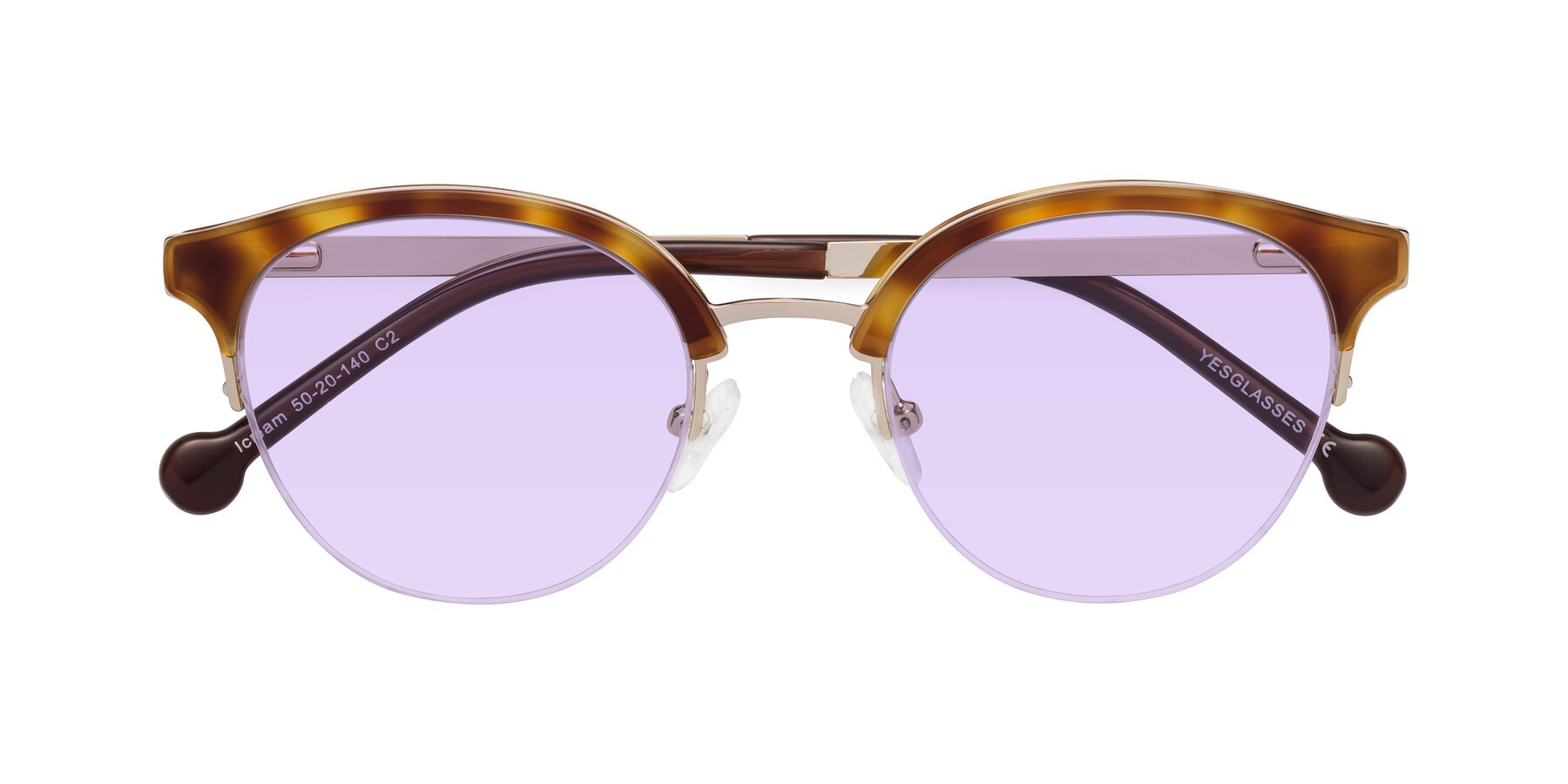 Folded Front of Icream in Tortoise-Gold with Light Purple Tinted Lenses