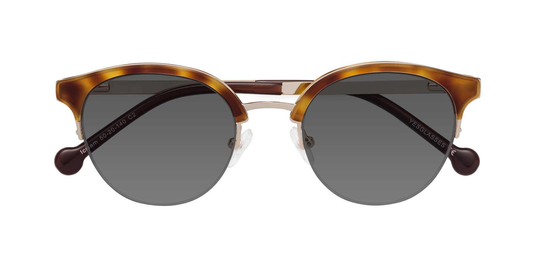 Folded Front of Icream in Tortoise-Gold with Medium Gray Tinted Lenses