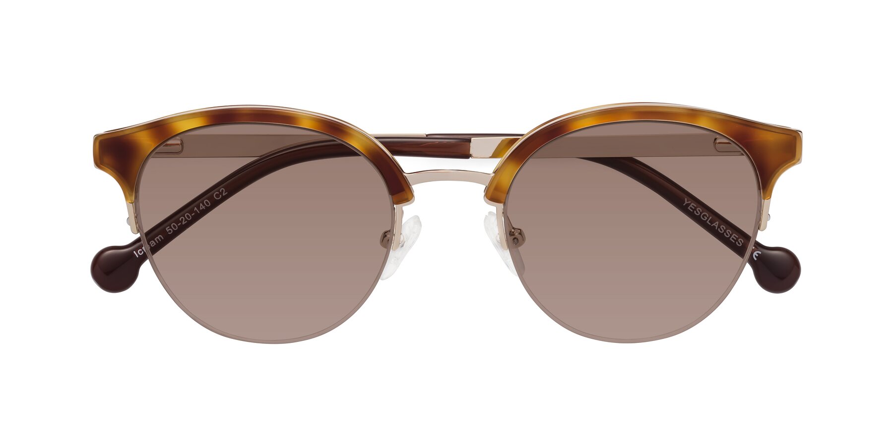 Folded Front of Icream in Tortoise-Gold with Medium Brown Tinted Lenses