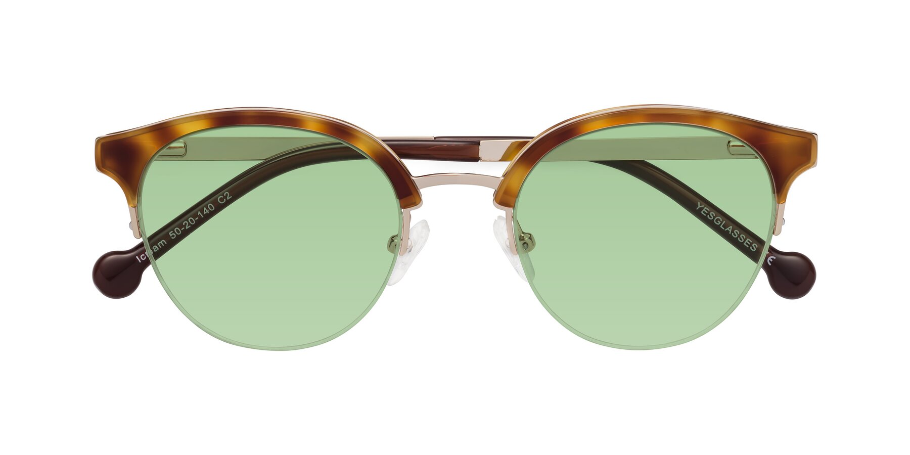 Folded Front of Icream in Tortoise-Gold with Medium Green Tinted Lenses