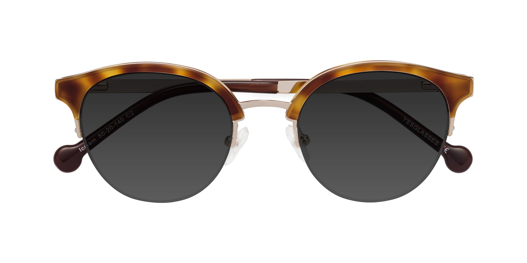 Folded Front of Icream in Tortoise-Gold with Gray Tinted Lenses