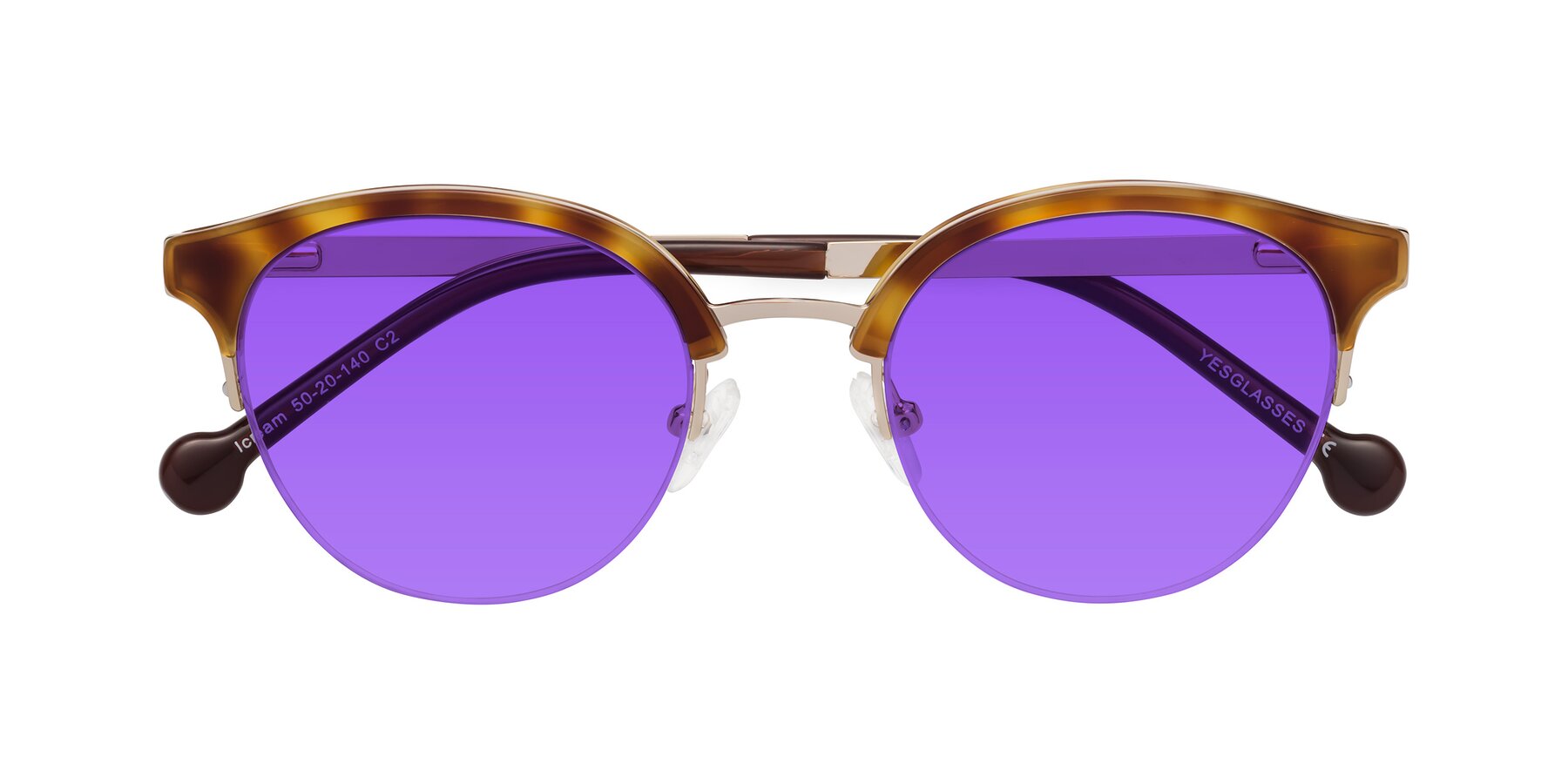 Folded Front of Icream in Tortoise-Gold with Purple Tinted Lenses