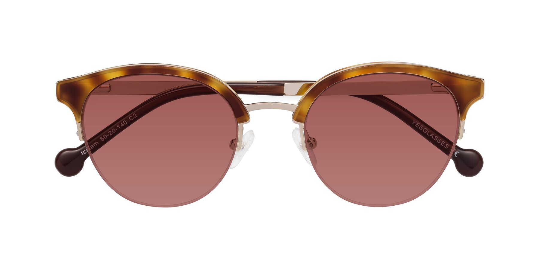 Folded Front of Icream in Tortoise-Gold with Garnet Tinted Lenses