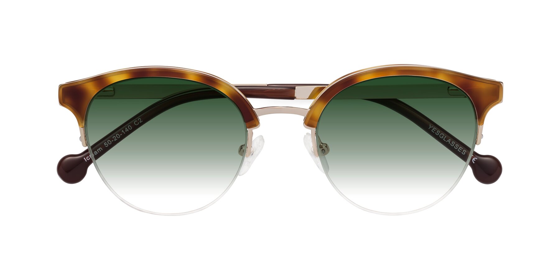 Folded Front of Icream in Tortoise-Gold with Green Gradient Lenses