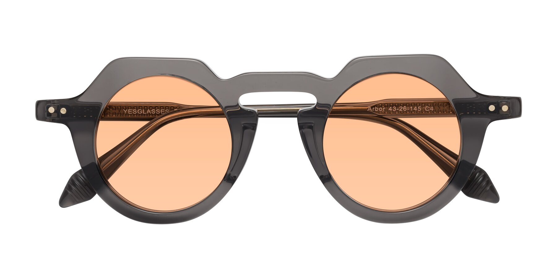 Folded Front of Arbor in Translucent Gray with Light Orange Tinted Lenses