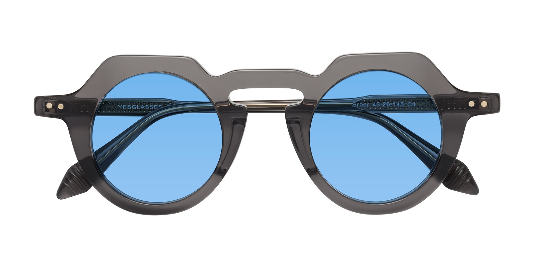 Folded Front of Arbor in Translucent Gray with Medium Blue Tinted Lenses