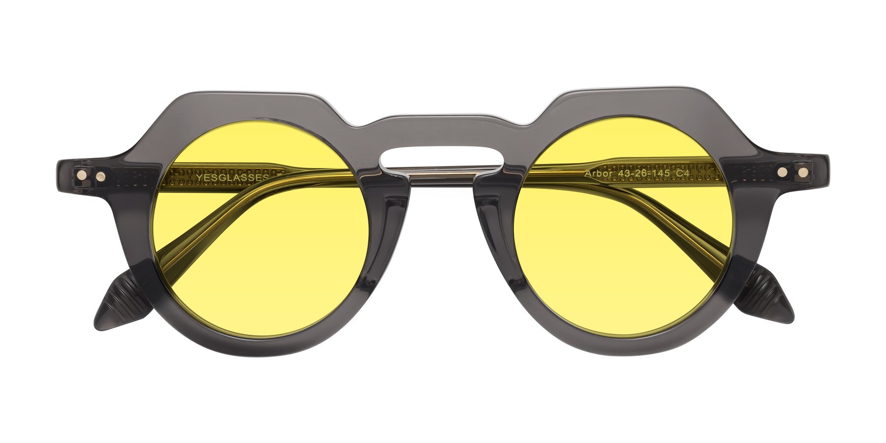 Folded Front of Arbor in Translucent Gray with Medium Yellow Tinted Lenses