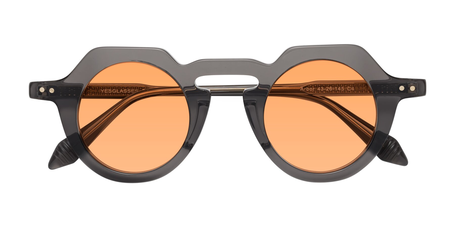 Folded Front of Arbor in Translucent Gray with Medium Orange Tinted Lenses