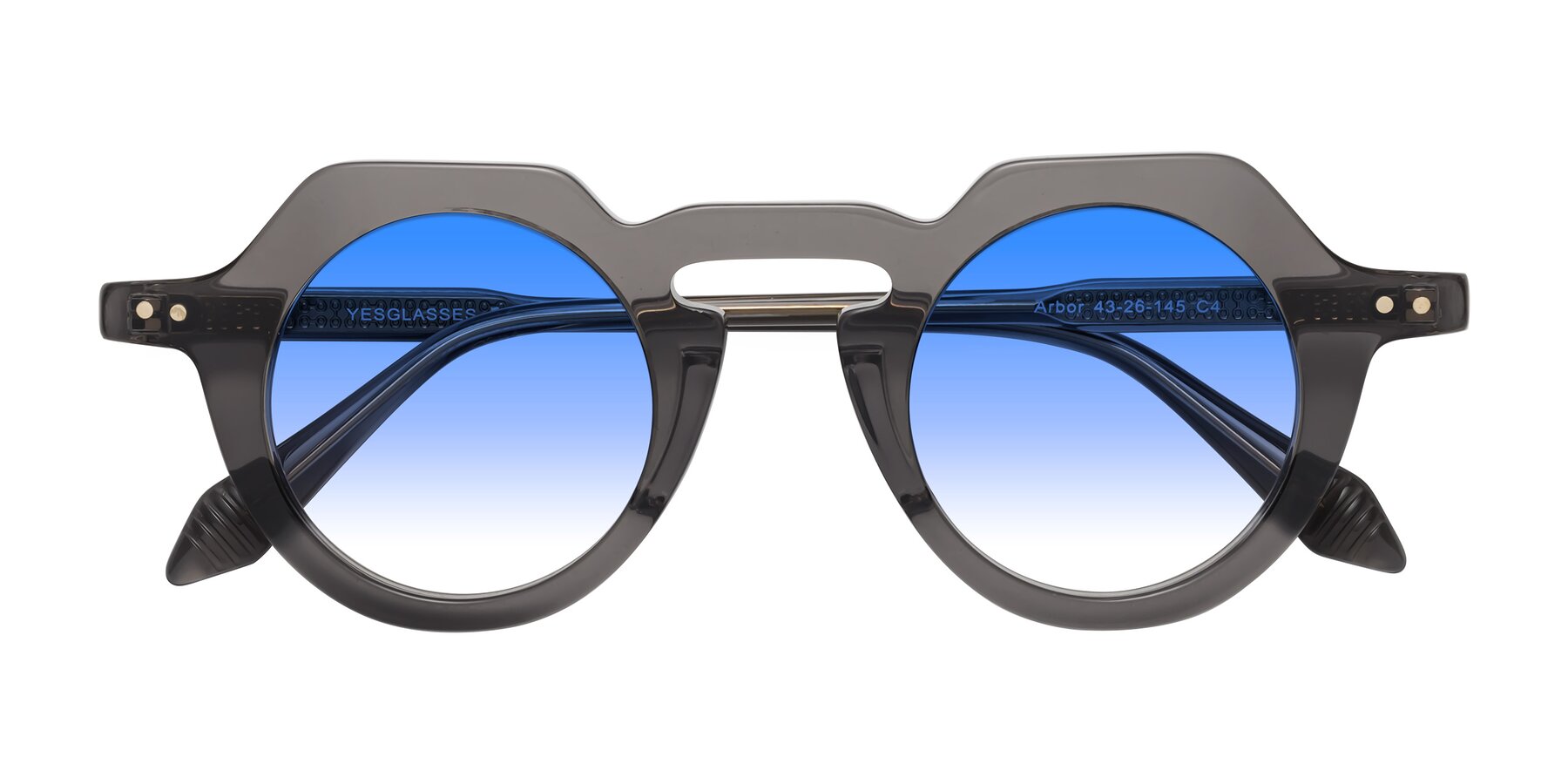 Folded Front of Arbor in Translucent Gray with Blue Gradient Lenses