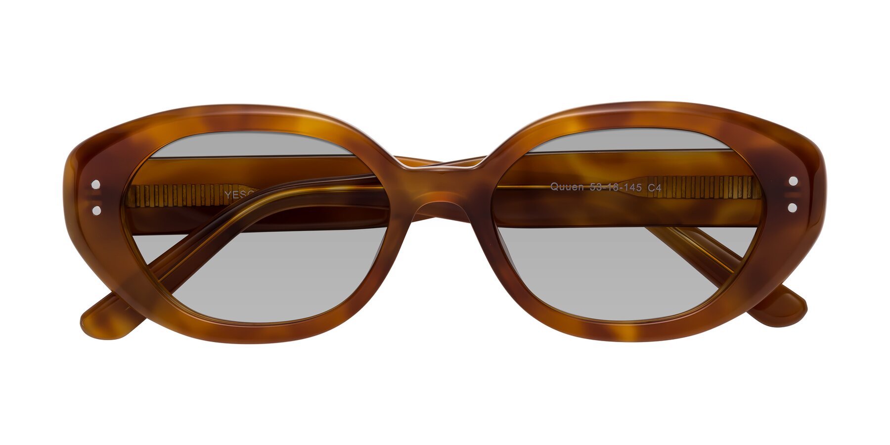 Folded Front of Quuen in Amber Tortoise with Light Gray Tinted Lenses