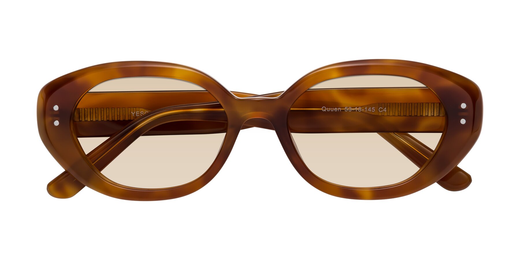 Folded Front of Quuen in Amber Tortoise with Light Brown Tinted Lenses