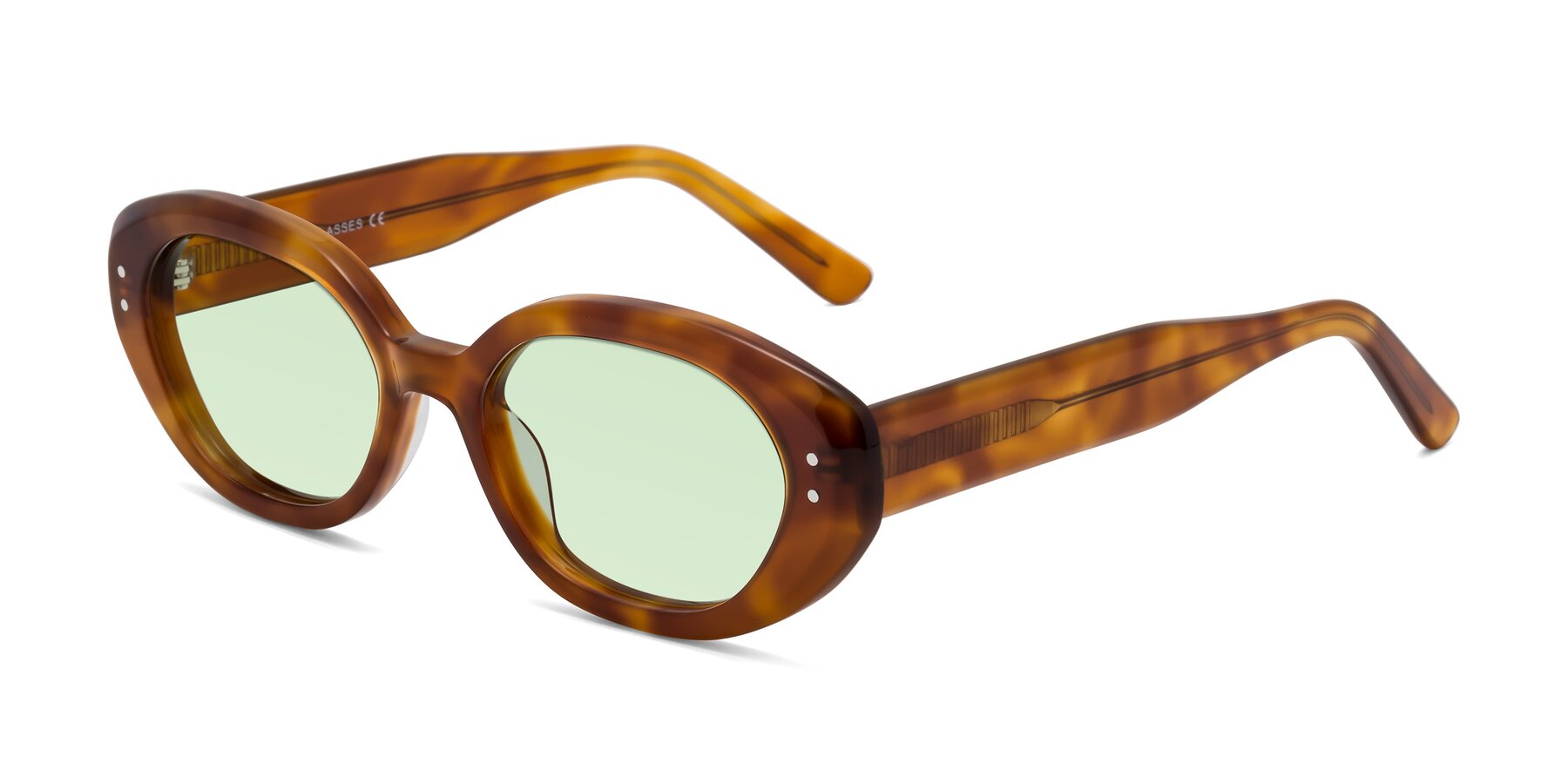 Angle of Quuen in Amber Tortoise with Light Green Tinted Lenses