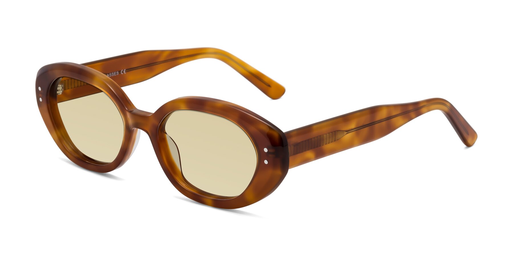 Angle of Quuen in Amber Tortoise with Light Champagne Tinted Lenses