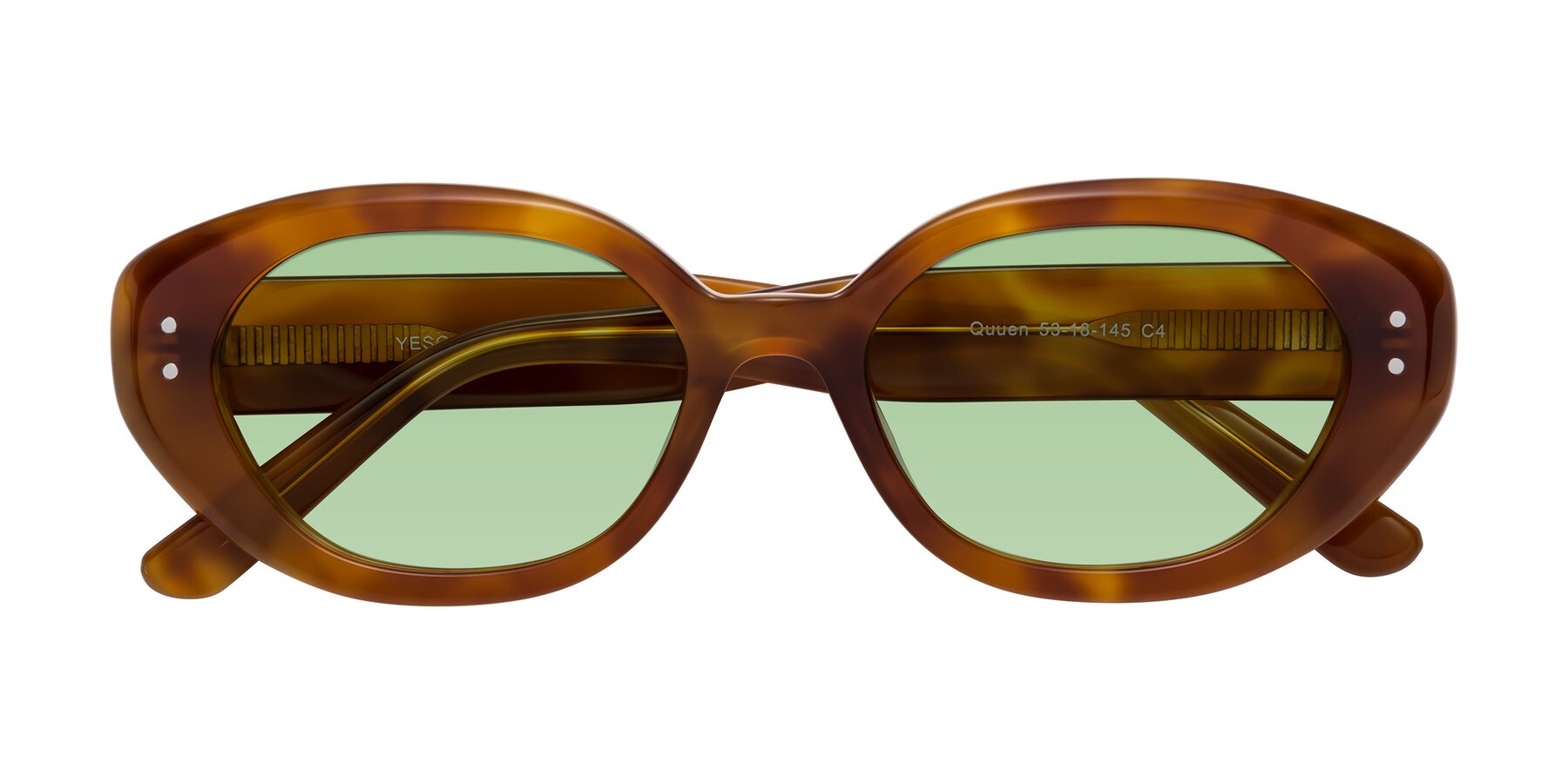 Folded Front of Quuen in Amber Tortoise with Medium Green Tinted Lenses