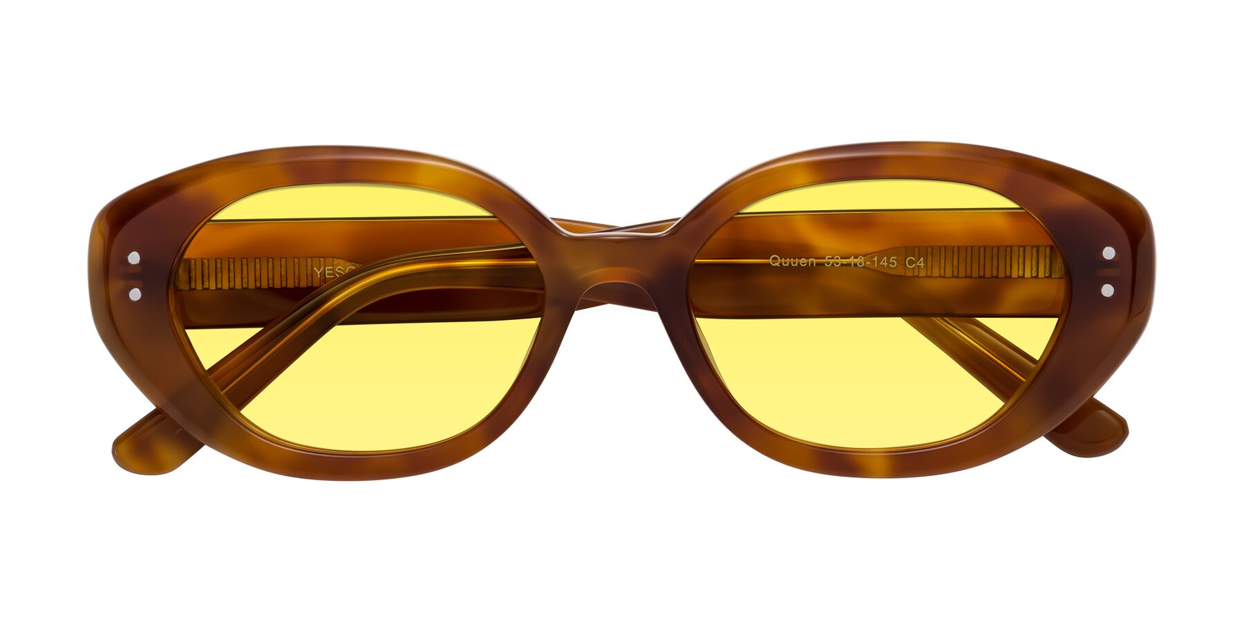 Folded Front of Quuen in Amber Tortoise with Medium Yellow Tinted Lenses