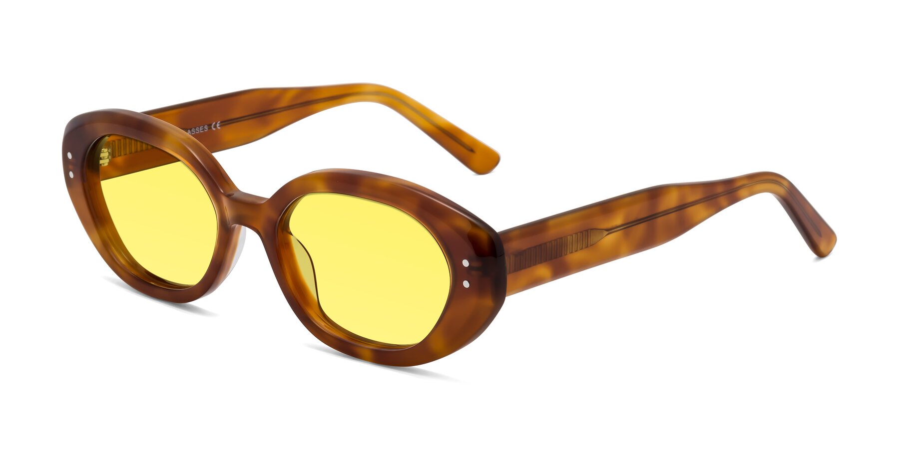 Angle of Quuen in Amber Tortoise with Medium Yellow Tinted Lenses