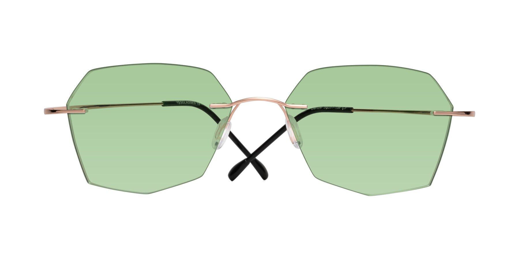 Folded Front of Denzel in Rose Gold with Medium Green Tinted Lenses