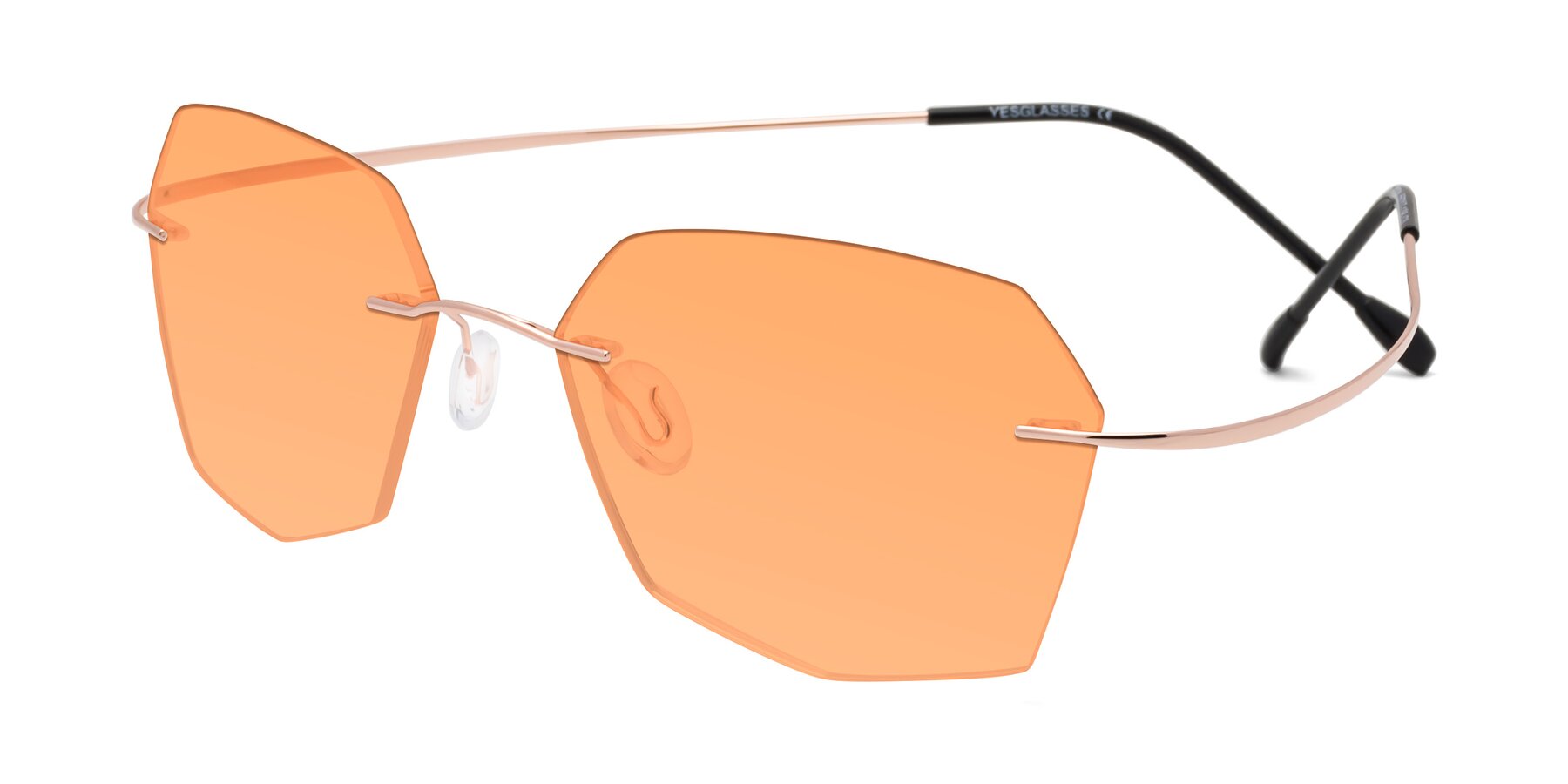 Angle of Denzel in Rose Gold with Medium Orange Tinted Lenses