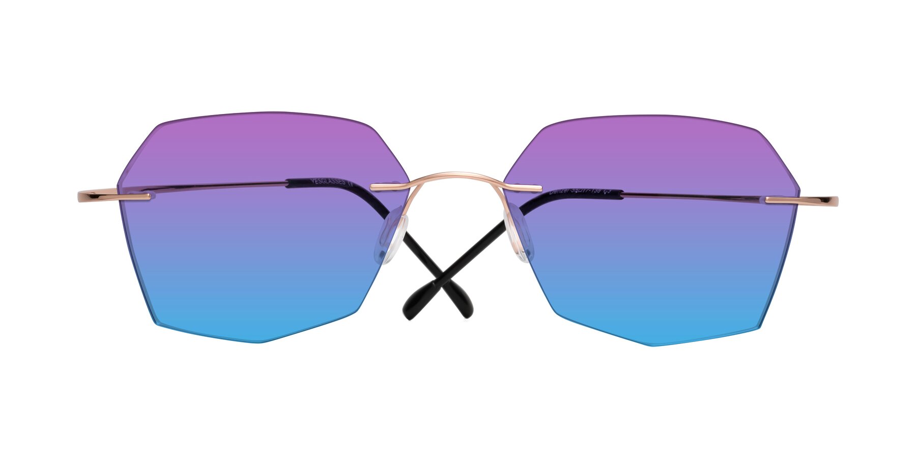 Folded Front of Denzel in Rose Gold with Purple / Blue Gradient Lenses