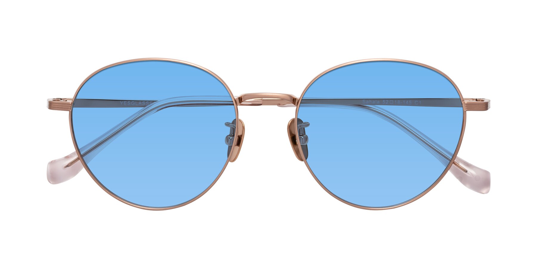 Folded Front of Sahala in Rose Gold with Medium Blue Tinted Lenses