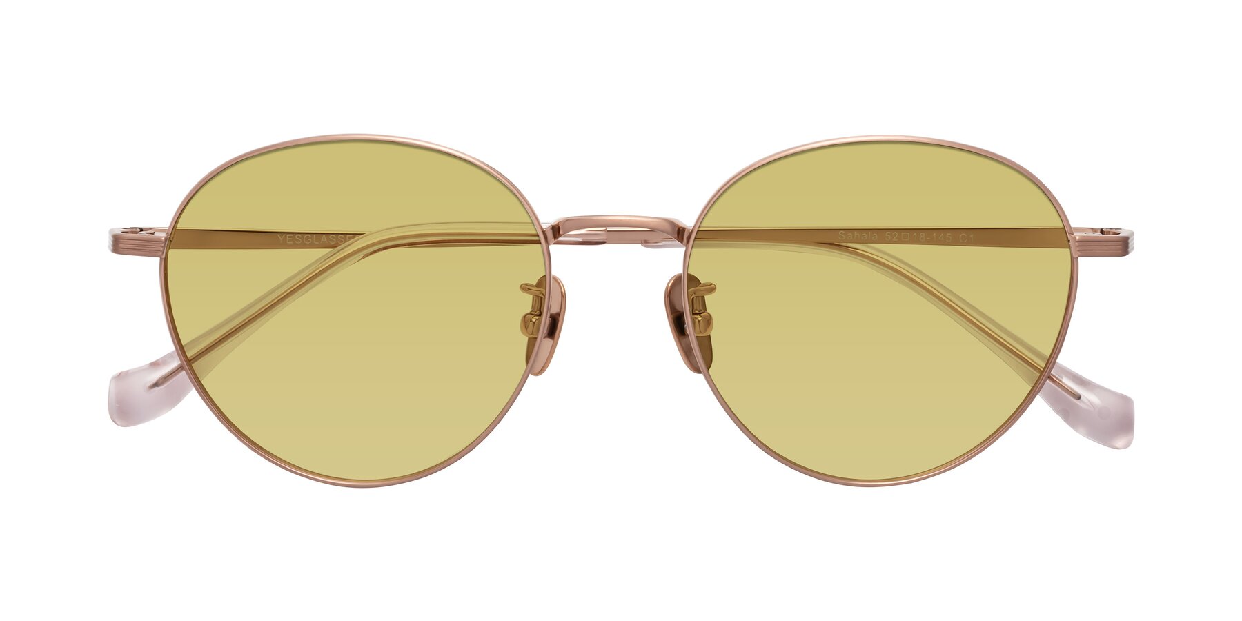 Folded Front of Sahala in Rose Gold with Medium Champagne Tinted Lenses