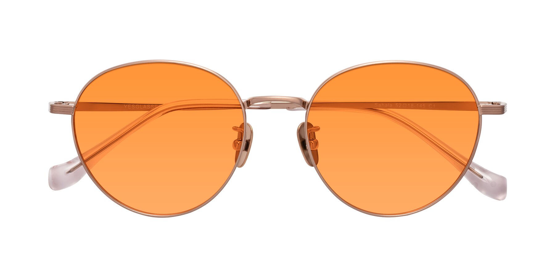 Folded Front of Sahala in Rose Gold with Orange Tinted Lenses