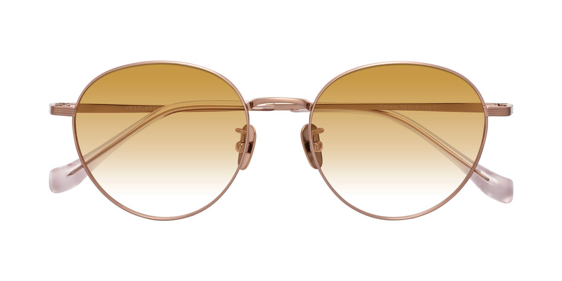 Folded Front of Sahala in Rose Gold with Champagne Gradient Lenses