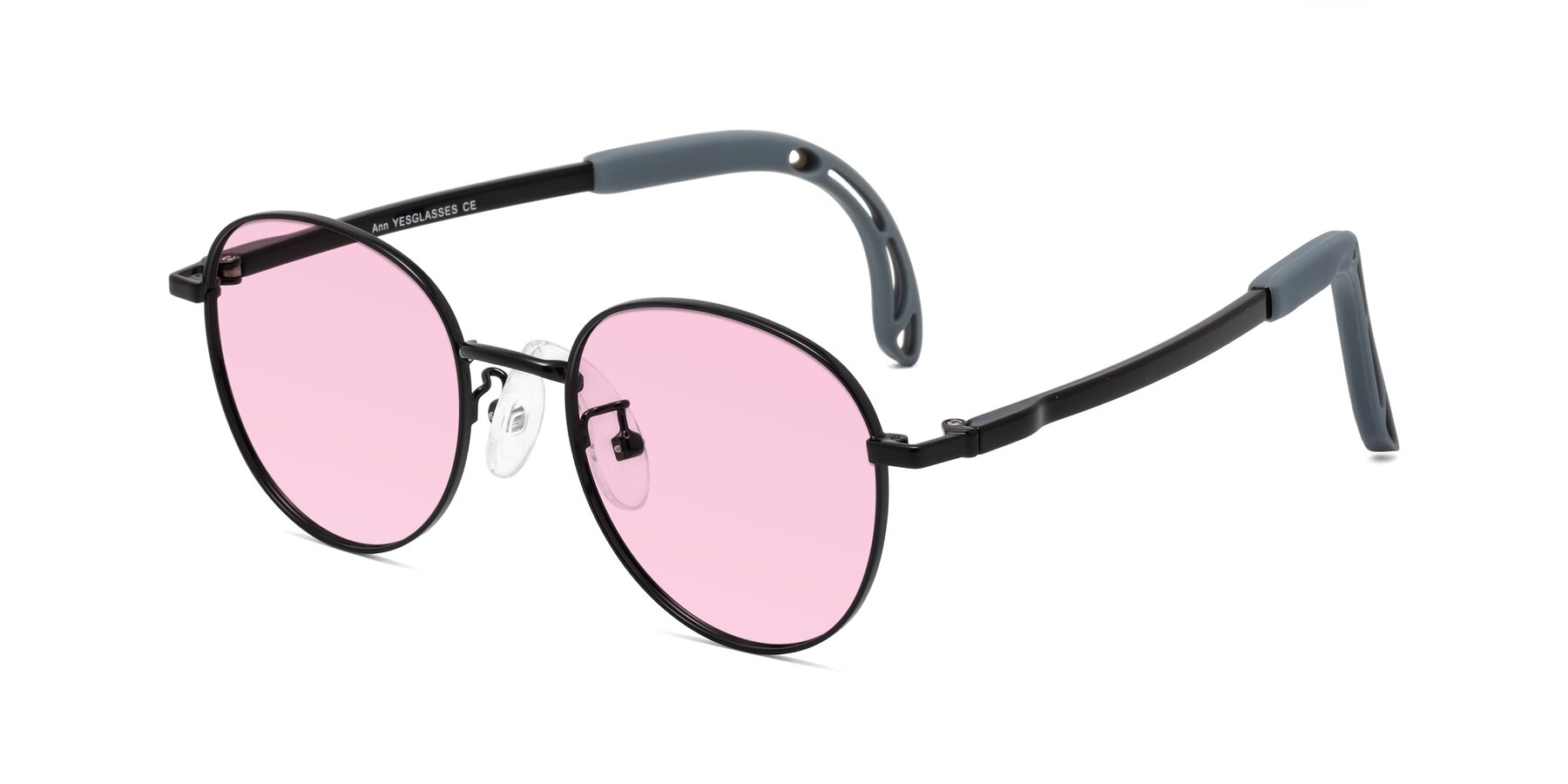 Angle of Ann in Ninja Black with Light Pink Tinted Lenses