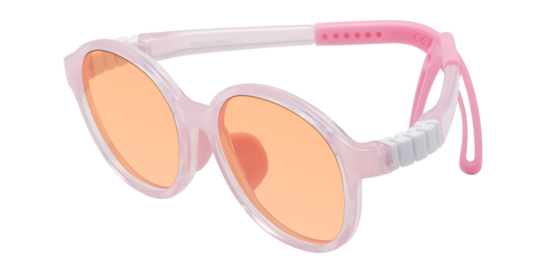 Angle of Zerlina in Artist Pink with Light Orange Tinted Lenses