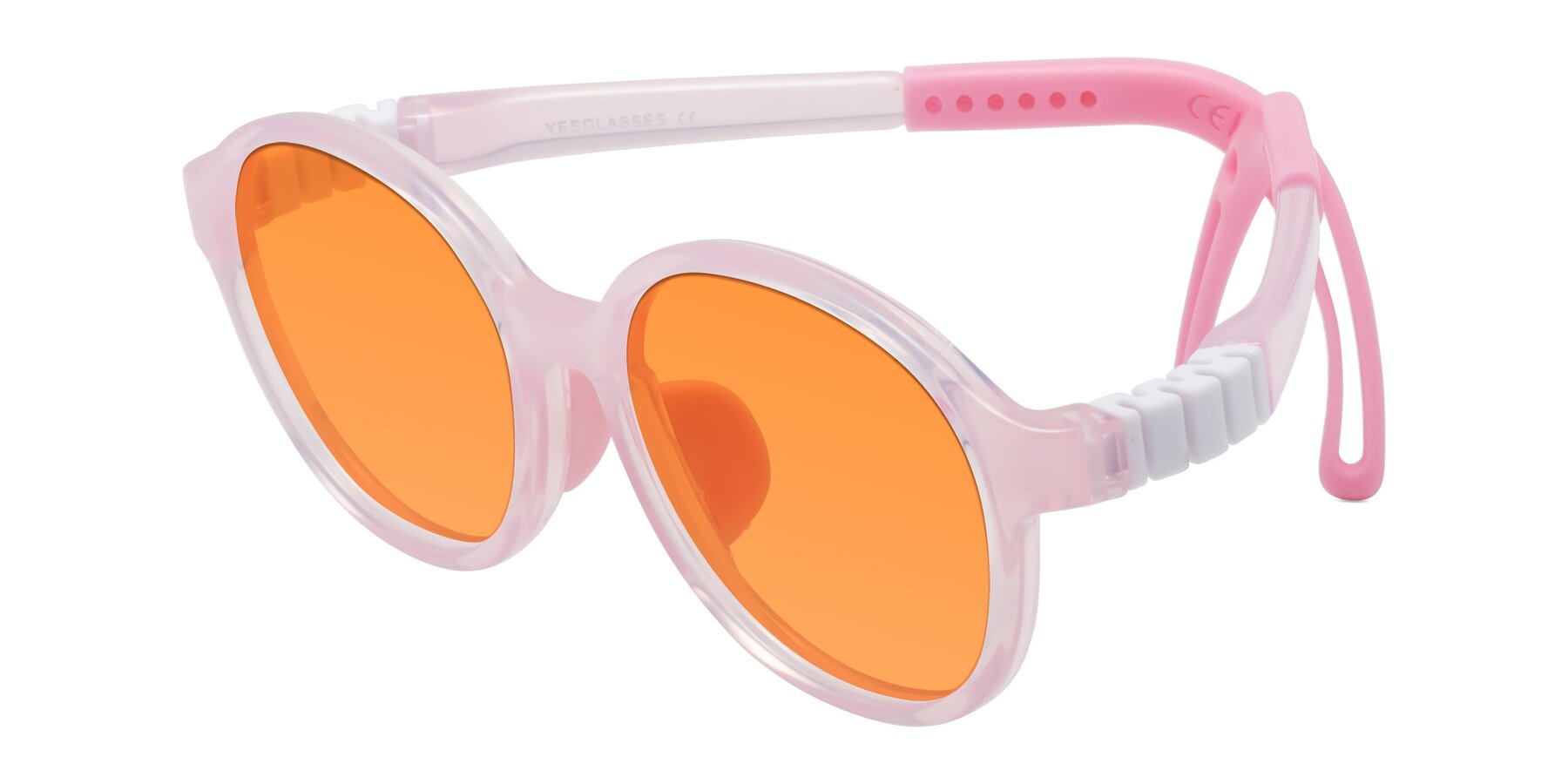 Angle of Zerlina in Artist Pink with Orange Tinted Lenses