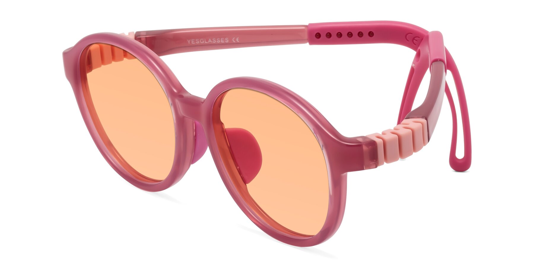 Angle of Zerlina in Poet Rose with Light Orange Tinted Lenses