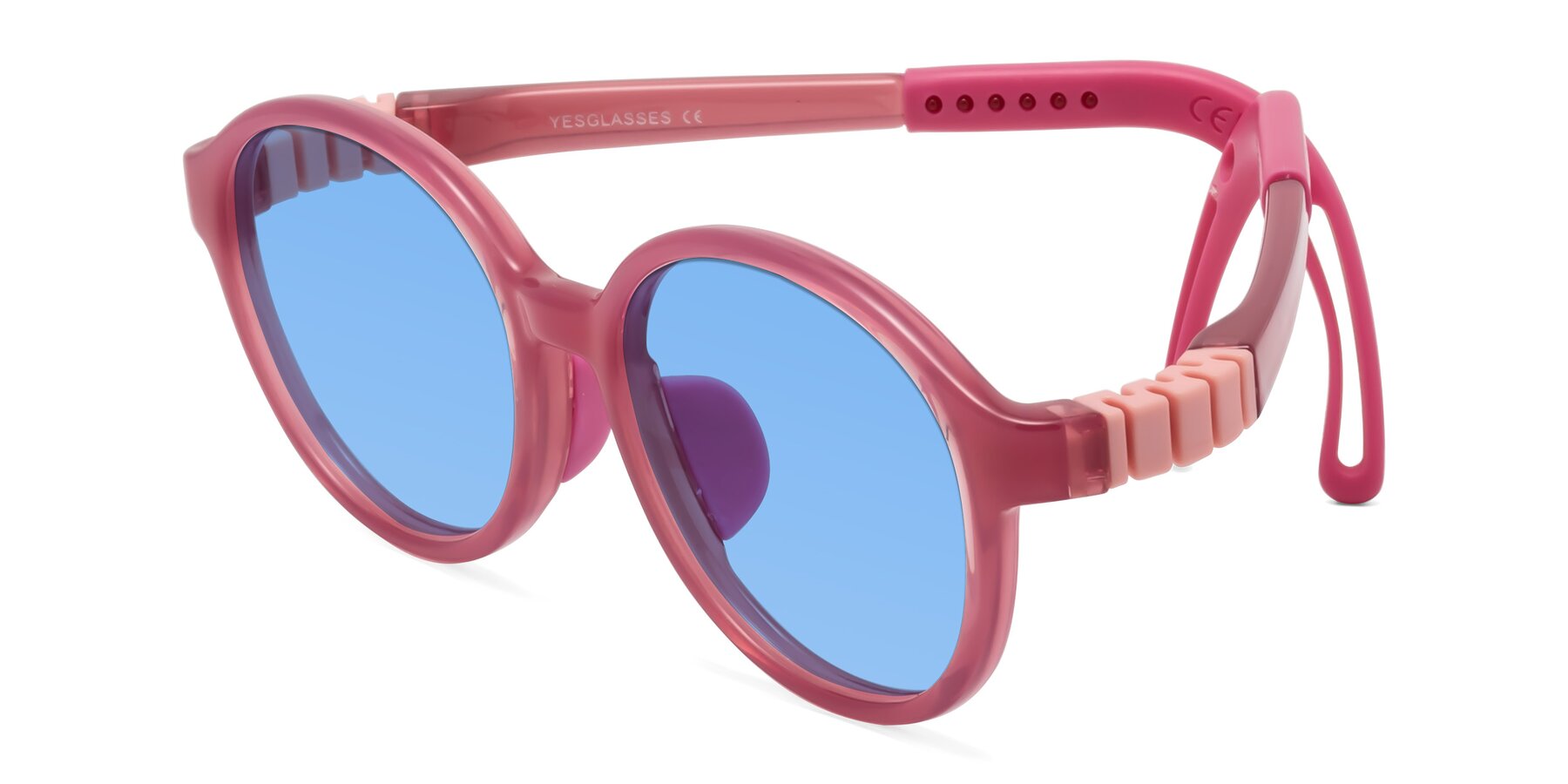 Angle of Zerlina in Poet Rose with Medium Blue Tinted Lenses