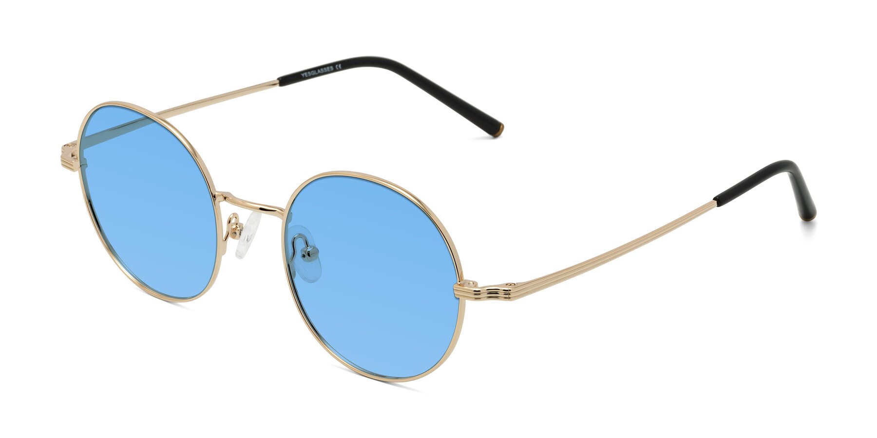 Angle of Sword in Light Gold with Medium Blue Tinted Lenses