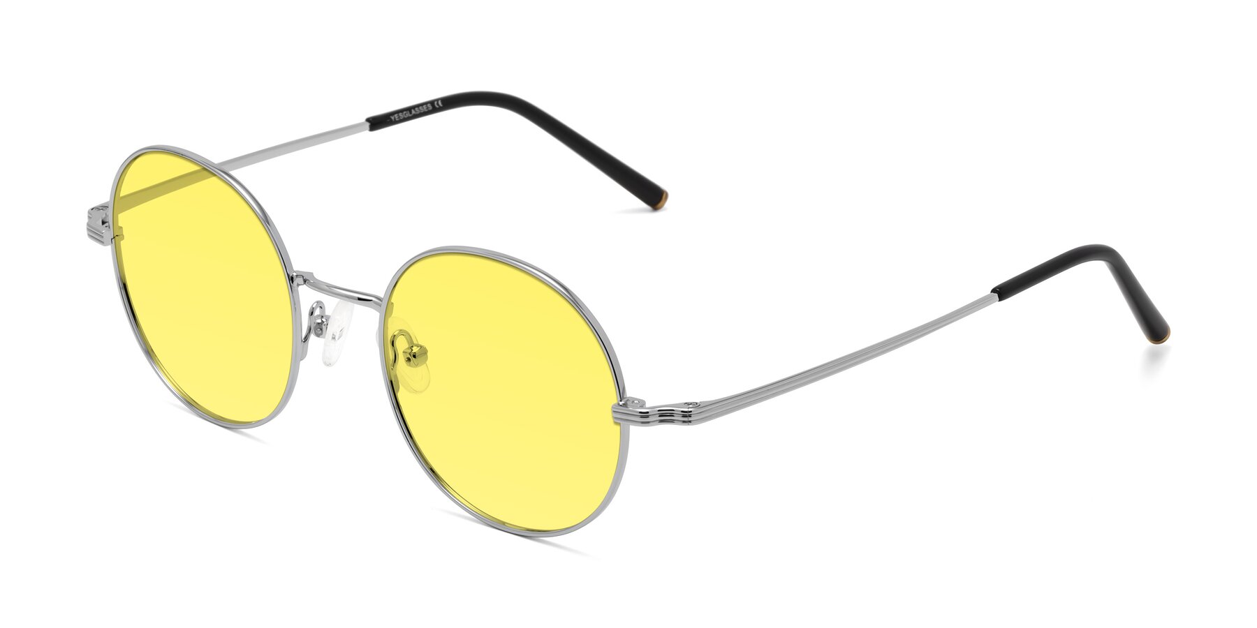 Angle of Sword in Silver with Medium Yellow Tinted Lenses