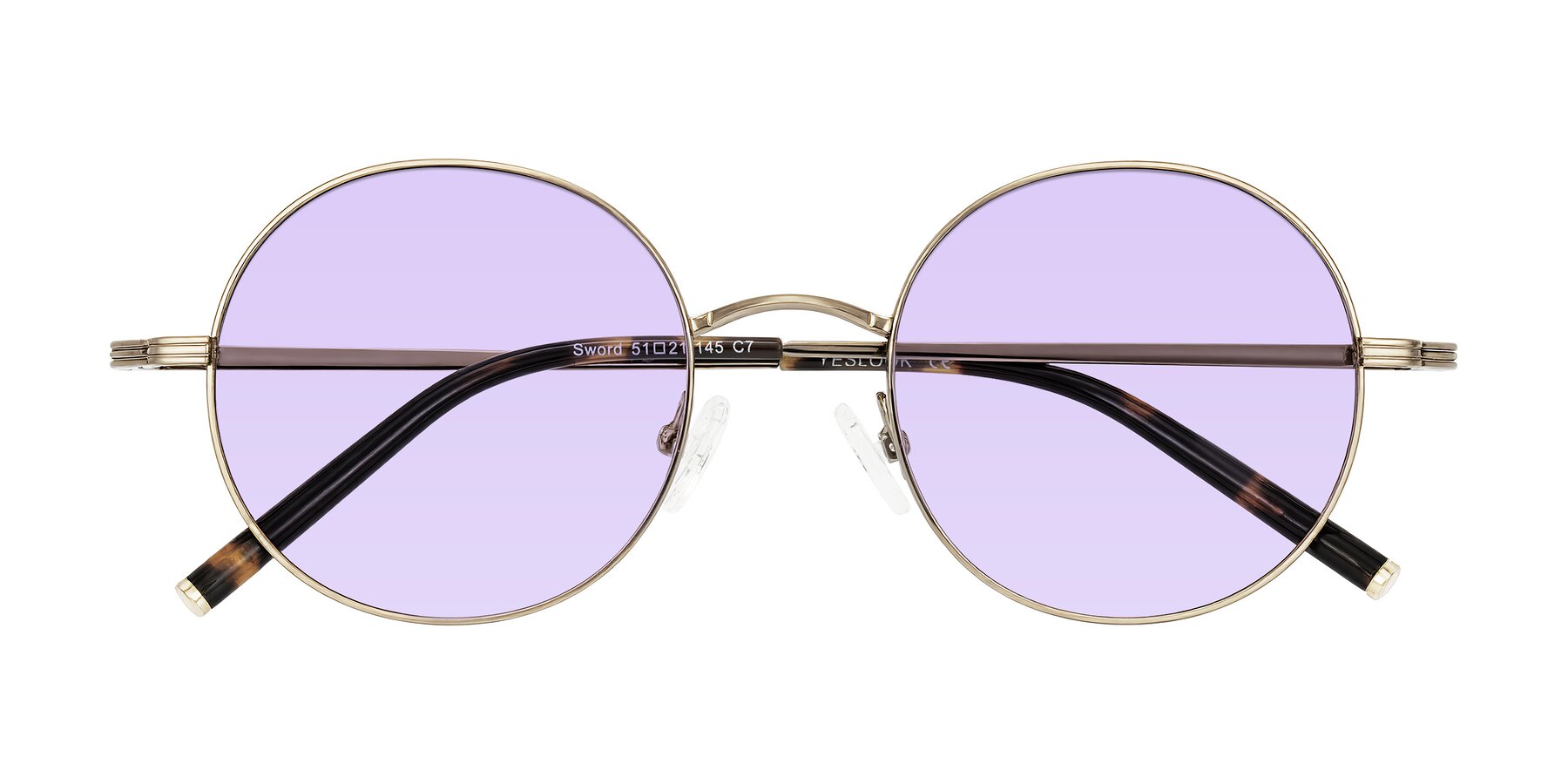 Folded Front of Sword in Antique Brass/Tortoise with Light Purple Tinted Lenses