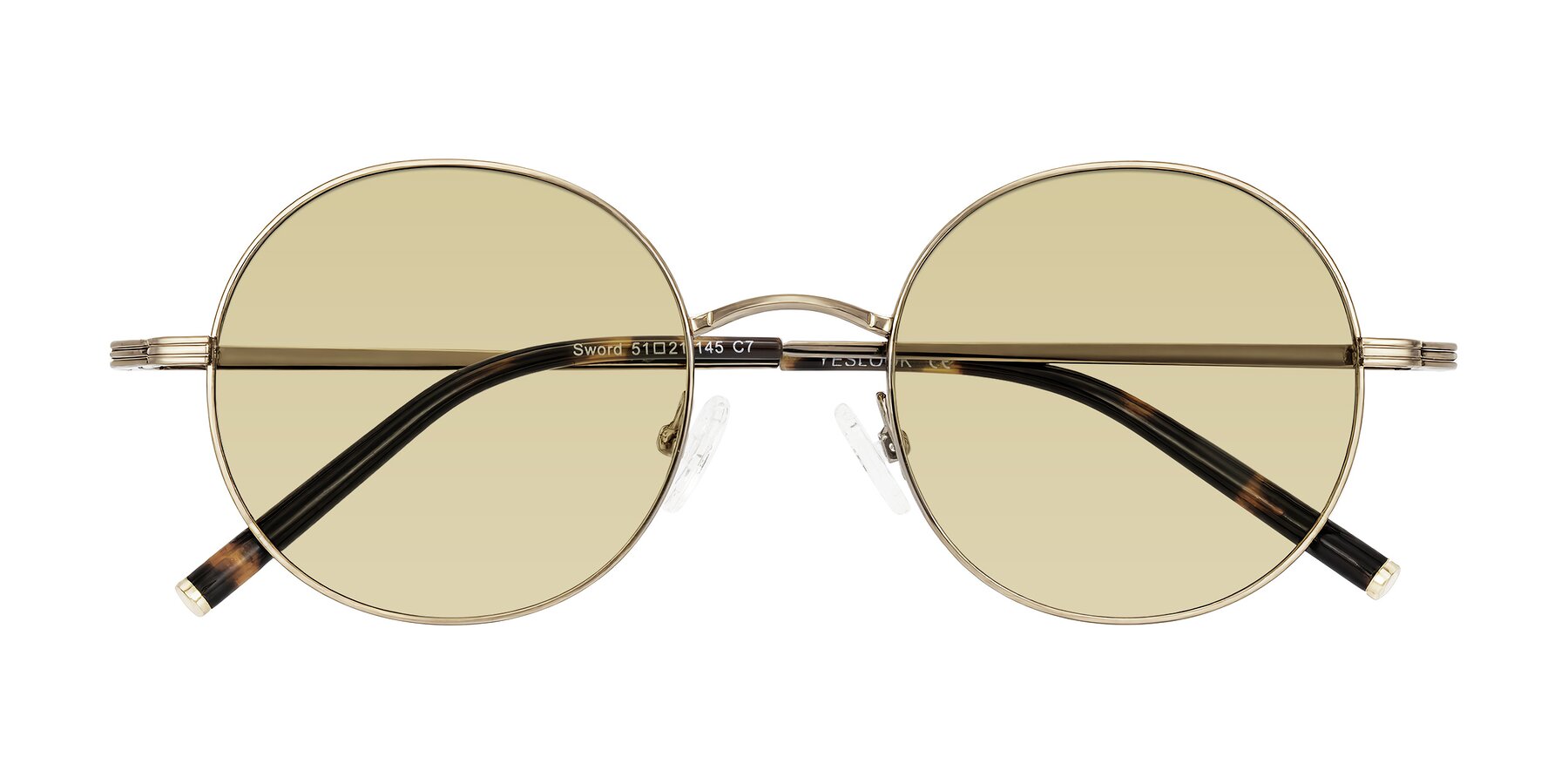 Folded Front of Sword in Antique Brass/Tortoise with Light Champagne Tinted Lenses