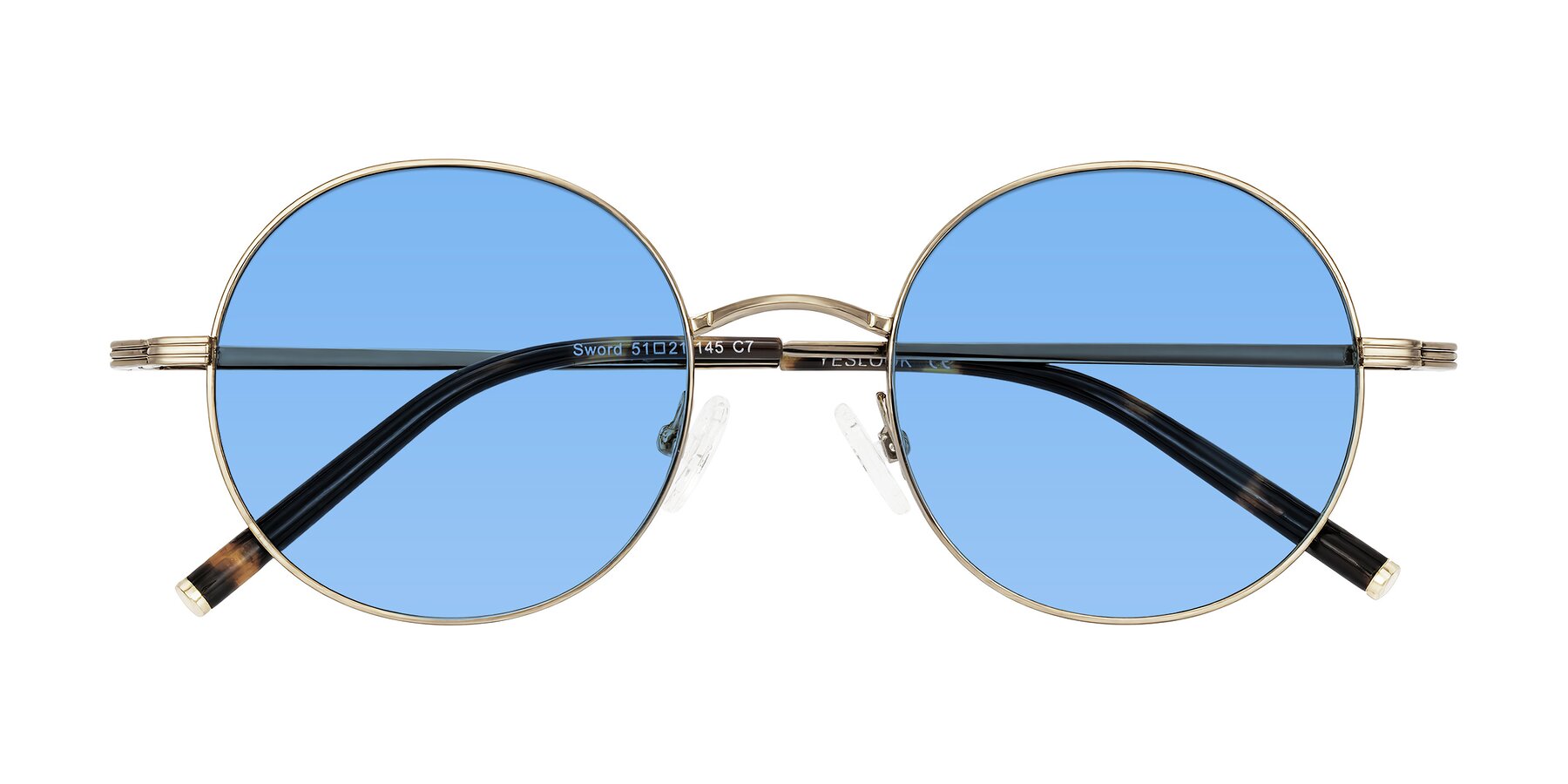 Folded Front of Sword in Antique Brass/Tortoise with Medium Blue Tinted Lenses