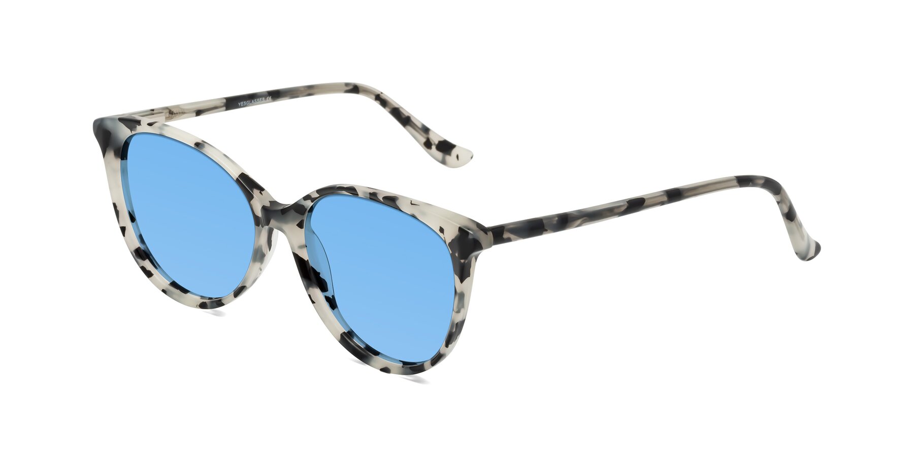 Angle of Maria in Ivory Tortoise with Medium Blue Tinted Lenses